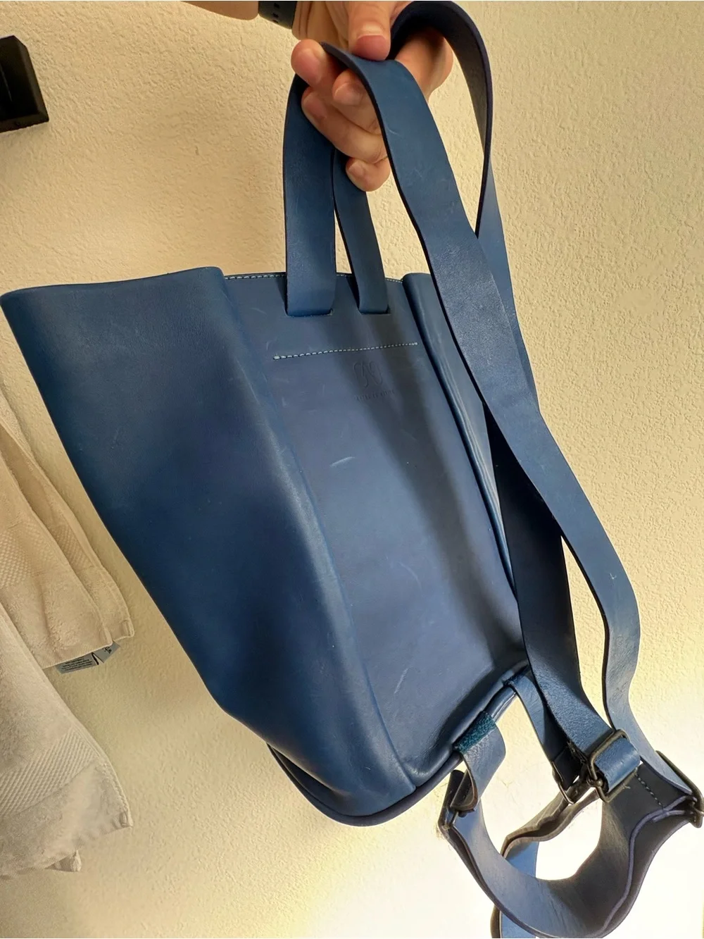 Structured Navy Leather Tote Backpack with Copper Accent